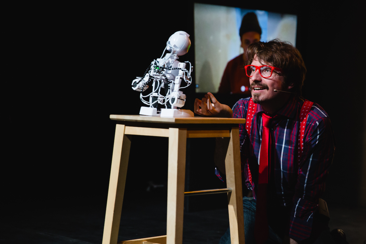 Piotr Mirowski, Kory Mathewson and A.L.Ex the robot. Performance of HumanMachine: binary2 - Transatlantic Artificial Intelligence Improv on 31 March 2017 at the Tristan Bates Theatre in London and Curious Comedy Theater in Portland. Image credits: Ross Gamble.